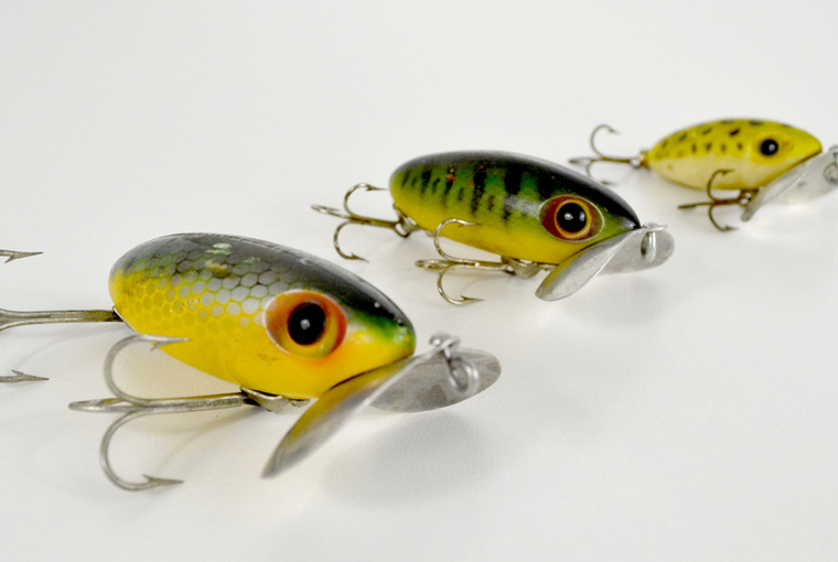 a close view of vintage jitterbug lures