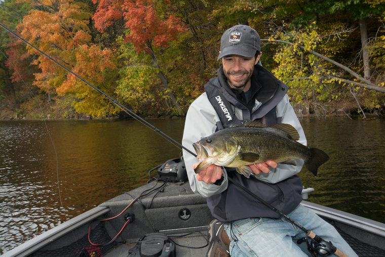 angler with largemouth bass