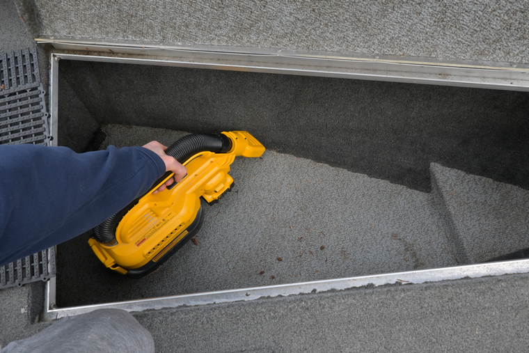 boat storage pest prevention vacuuming the boat to remove dirt and food crumbs
