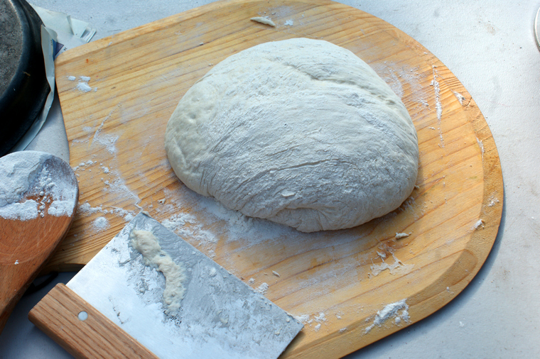 bread dough on a cutting board