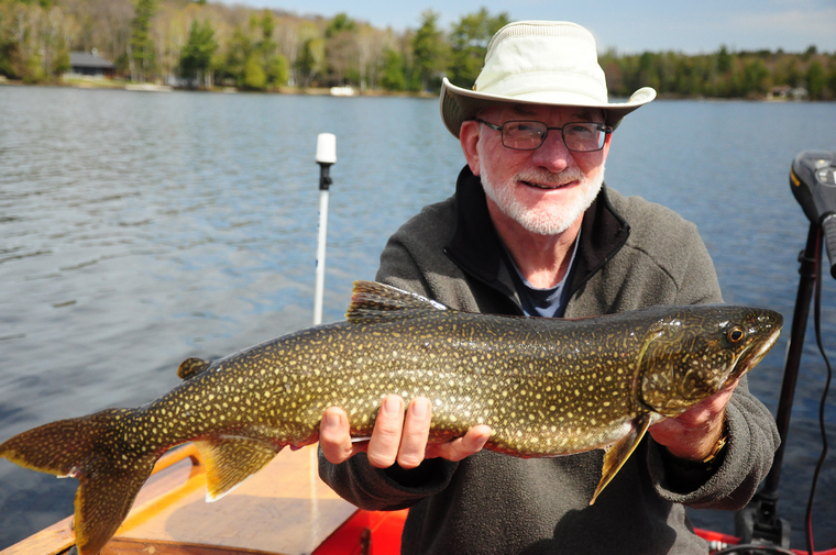 angler with a laker