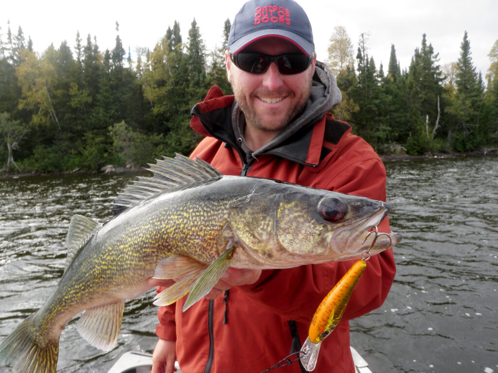 angler with a walleye